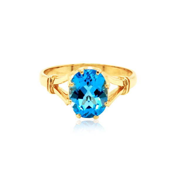 True blue topaz dress ring in 9ct yellow gold