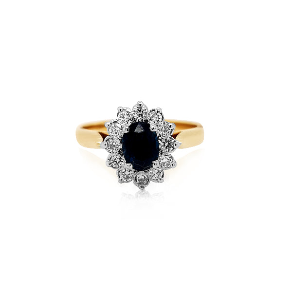 Madonna - oval ceylonese sapphire and diamond cluster ring in 18ct yellow and white gold
