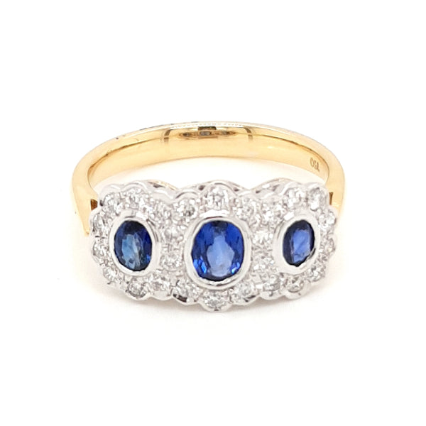 Rika - Sapphire and diamond cluster ring in 18ct yellow gold