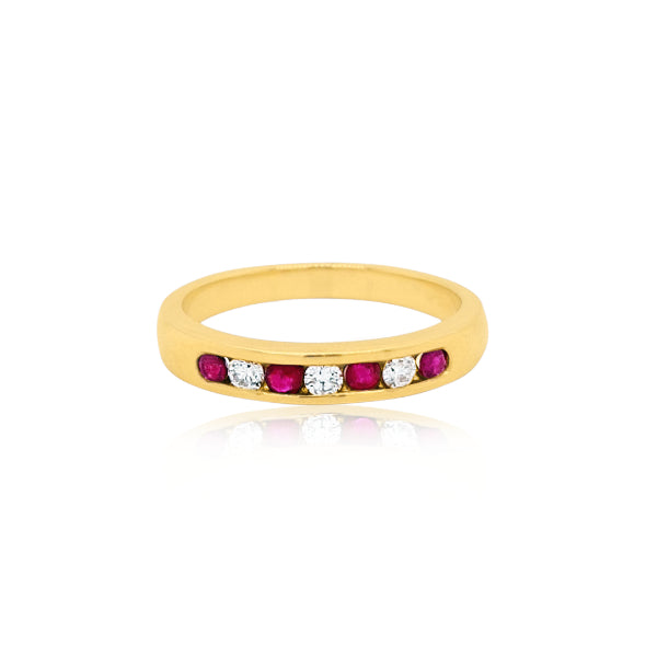 Leya - ruby and diamond channel set anniversary ring in 9ct Yellow gold
