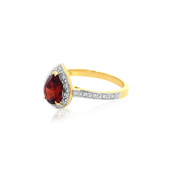 Malia - pear shaped garnet and diamond halo ring with diamond shoulders in 9ct yellow gold