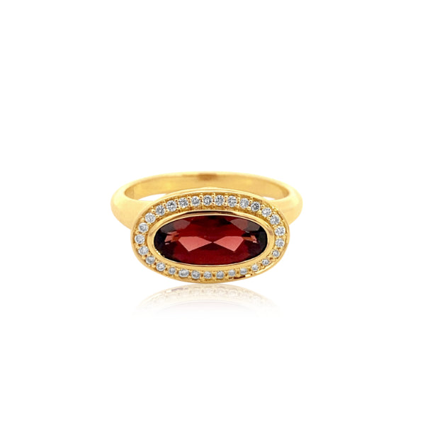 Marlowe- bezel set oval garnet dress ring with diamond halo in 9ct yellow gold