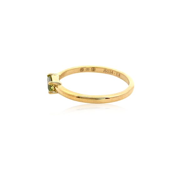 Solene - baguette shaped green sapphire dress ring in 9 ct yellow gold