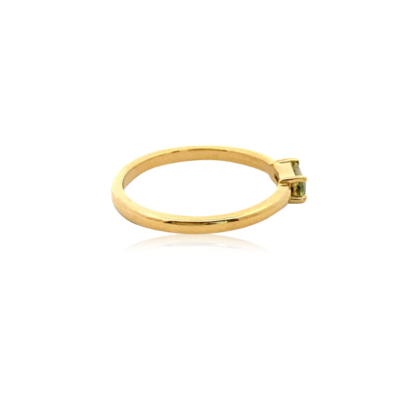Solene - baguette shaped green sapphire dress ring in 9 ct yellow gold