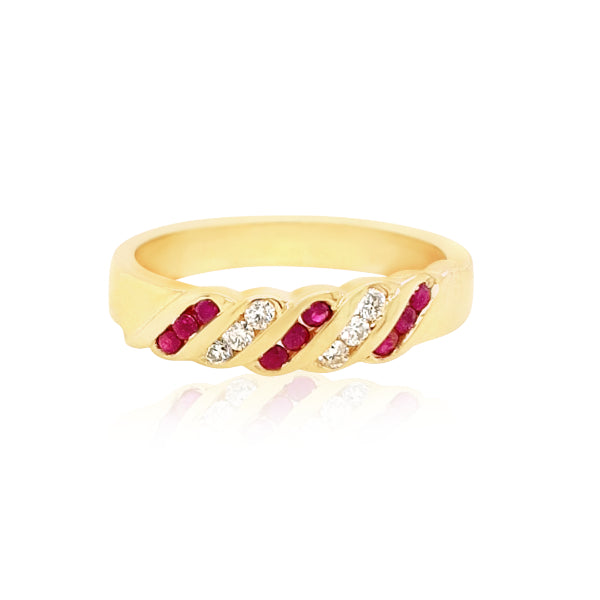 Diagonally set ruby and diamond anniversary ring in 9ct yellow gold