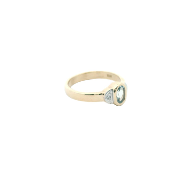 Aquamarine & diamond dress ring in 9ct yellow gold