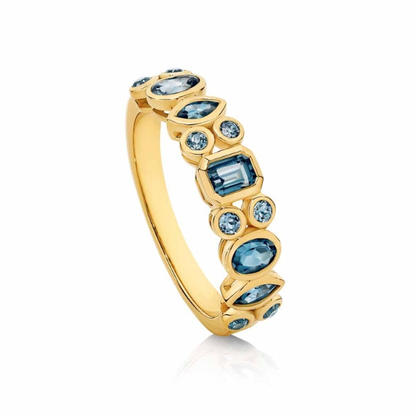 9ct yellow gold band with bezel set multi shape Blue Topaz.