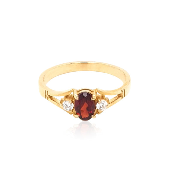 Garnet & CZ dress ring in 9ct yellow gold