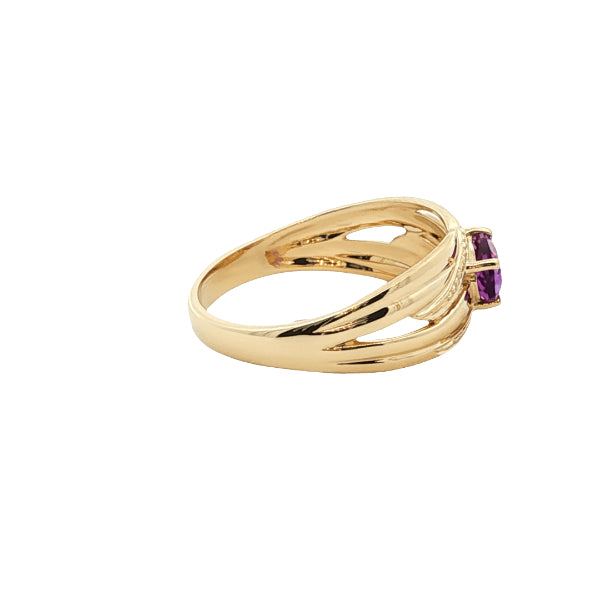 Oval amethyst ring on patterned ribbon band in 9ct yellow gold