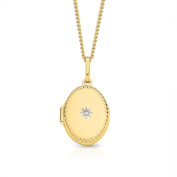 Diamond set oval locket in 9ct yellow gold with gold plated silver chain