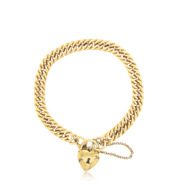 Heavy curb bracelet with heart clasp in 9ct yellow gold
