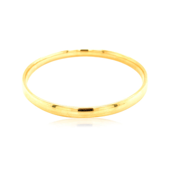 Oval golf bangle in 9ct yellow gold - 6mm wide