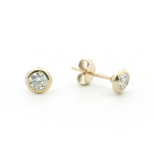 Half carat bezel set diamond studs earrings in 9ct yellow gold