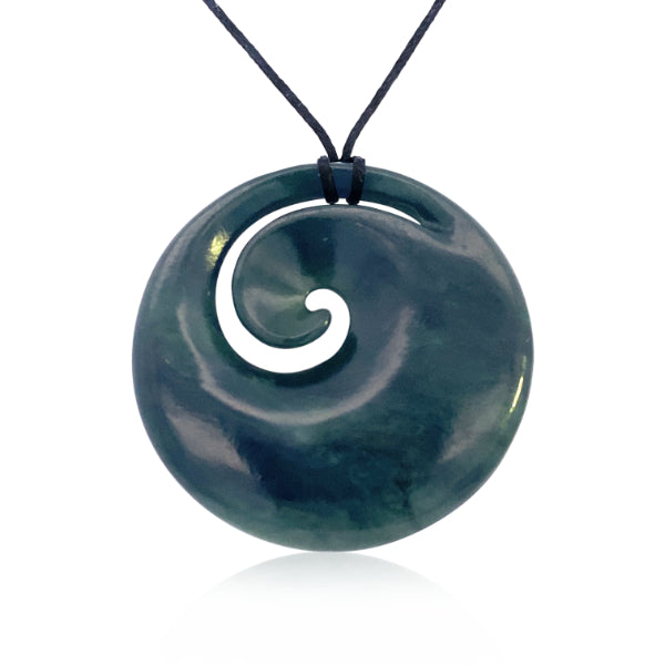 NZ pounamu greenstone circle with koru necklace on slider cord