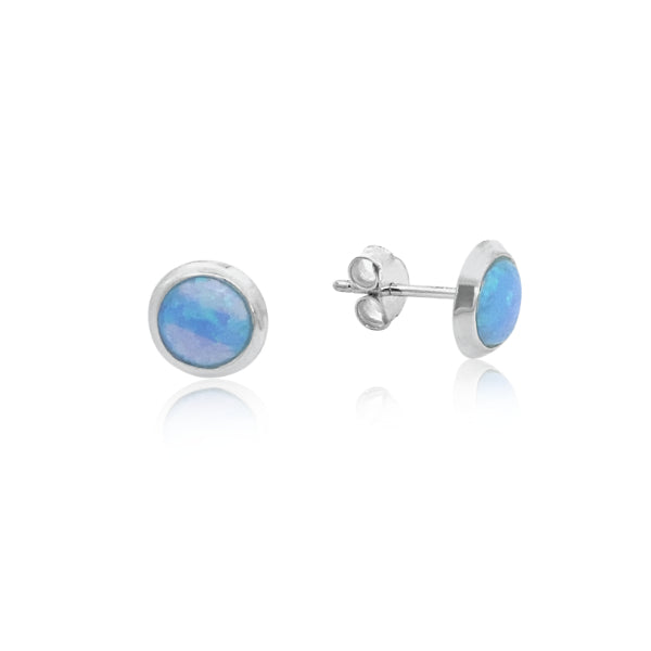 Light blue synthetic opal stud earrings in sterling silver