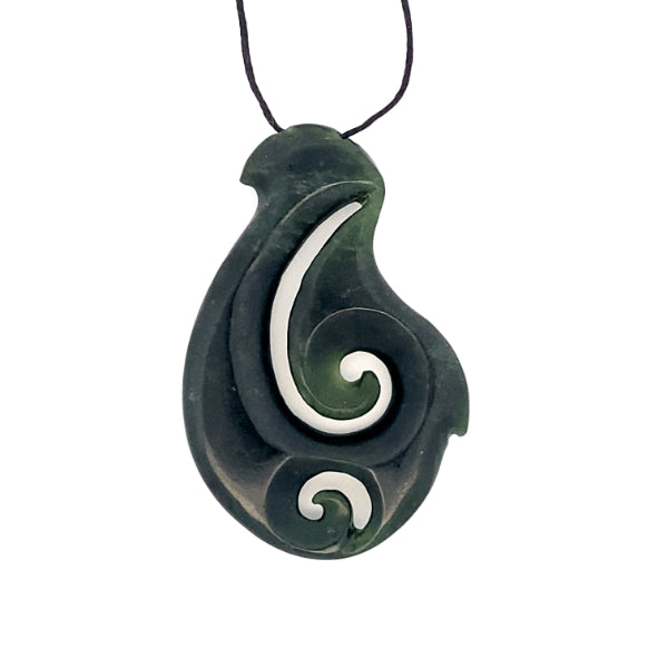NZ pounamu greenstone hook pendant with double koru on slider cord.