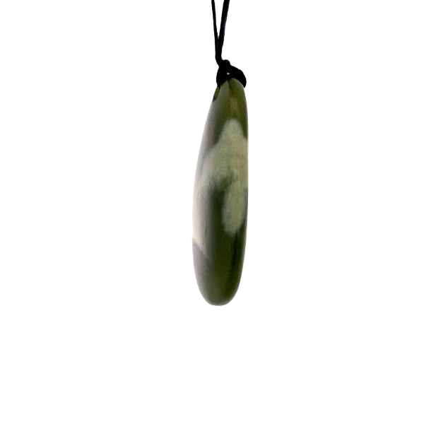 NZ pounamu greenstone flower jade pebble necklace on slider cord by Aden Hoglund