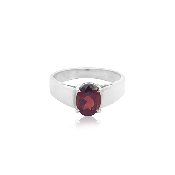 Oval garnet dress ring in sterling silver