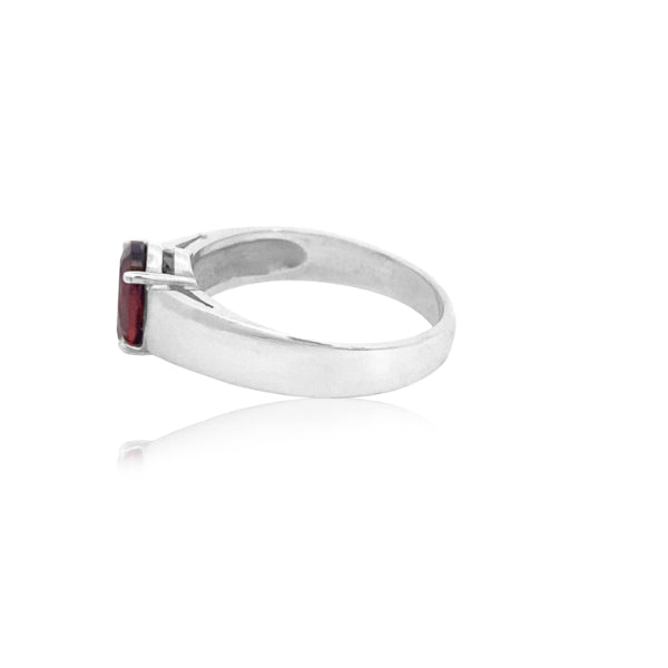 Oval garnet dress ring in sterling silver