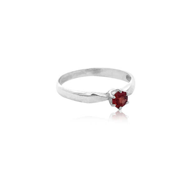 Garnet solitaire dress ring in sterling silver