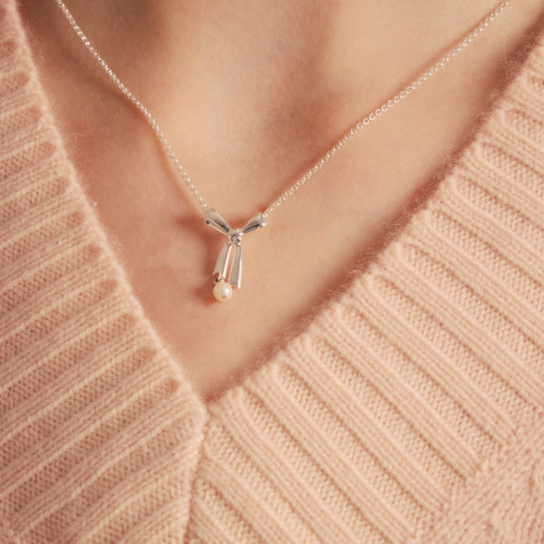 Karen Walker silver small bow necklace with pearl