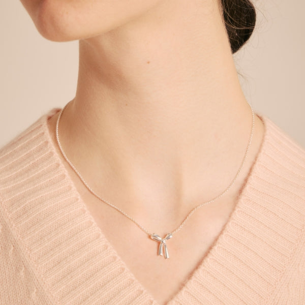 Karen walker silver small bow necklace