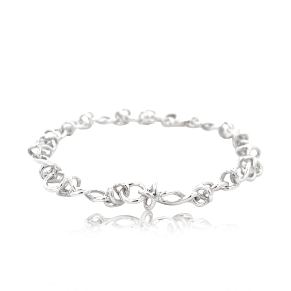 Eternity and cross over link bracelet in sterling silver - 19cm