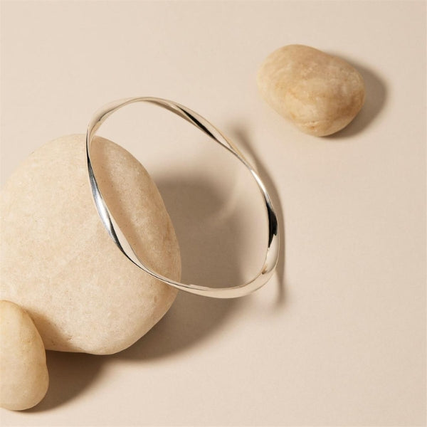 Najo - twisted ribbon tube bangle in sterling silver - 62mm