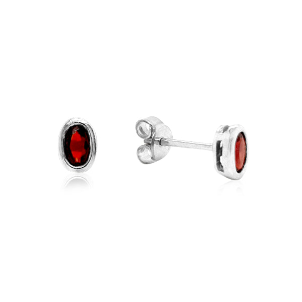 Oval garnet stud earrings in sterling silver