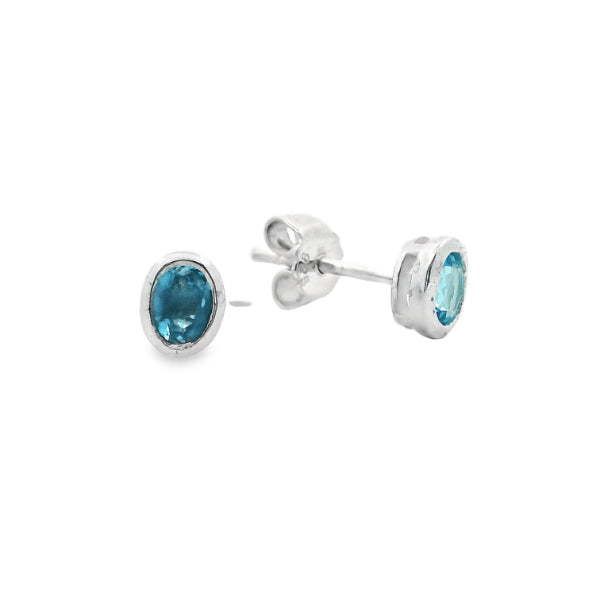 Blue topaz rubover stud earrings in sterling silver