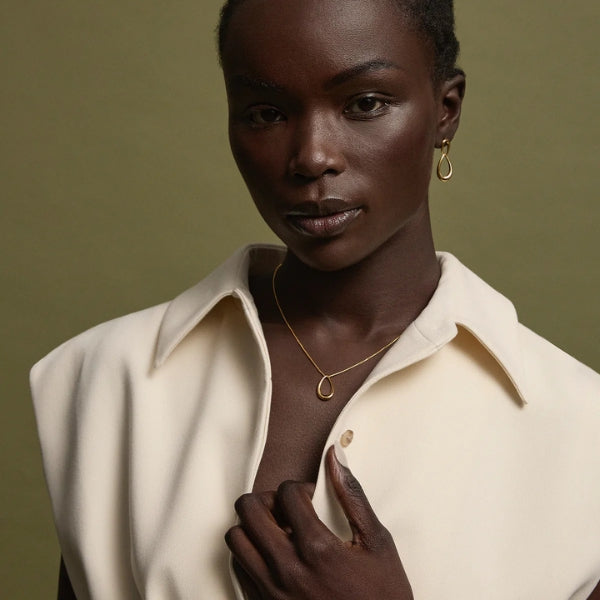 Najo - Teardrop stud earrings in yellow gold plated sterling silver