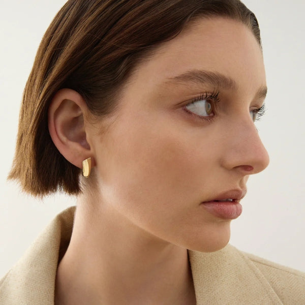 Najo - Horseshoe huggie earrings in yellow gold plated sterling silver