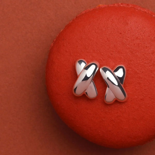 Najo - X shaped kiss stud earrings in sterling silver