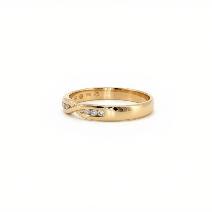 6 stone diamond crossover ring in 9ct yellow gold