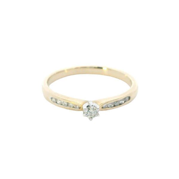 Diamond solitaire engagement ring with channel set diamond shoulders in 9ct gold