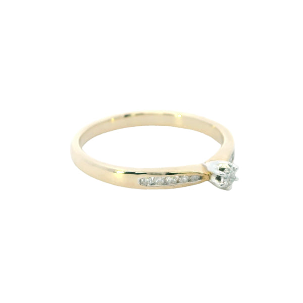 Diamond solitaire engagement ring with channel set diamond shoulders in 9ct gold