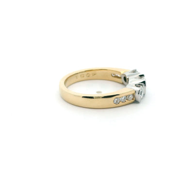 Sophie - 18ct two tone three stone semi- rubover ring with six channel set shoulder diamonds