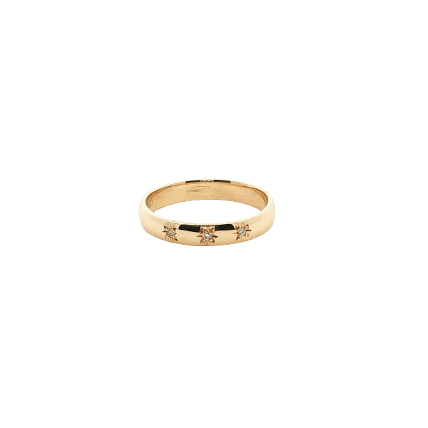 Star set diamond band ring in 9ct yeloow gold