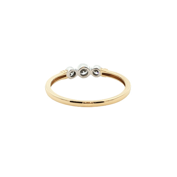 Three stone bezel set diamond ring in 9ct yellow gold