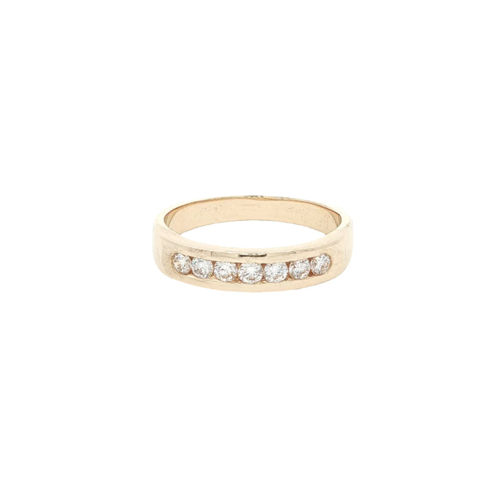 7 stone diamond channel set ring in 9ct yellow gold