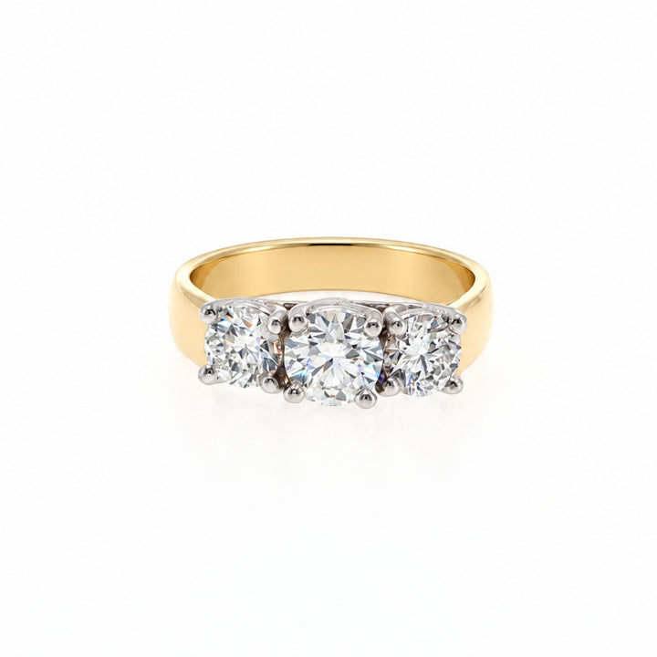 Three stone diamond ring in 18ct white gold and yellow gold