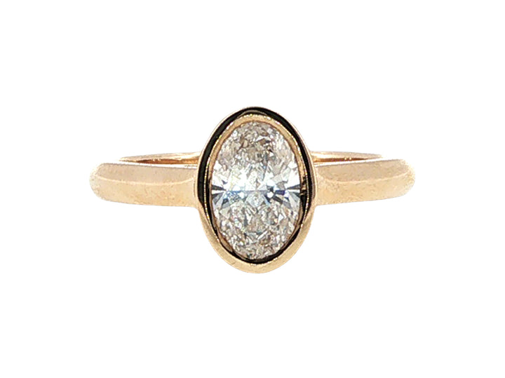 Lesia - one carat oval lab-grown diamond solitaire in 9ct yellow gold rubover setting