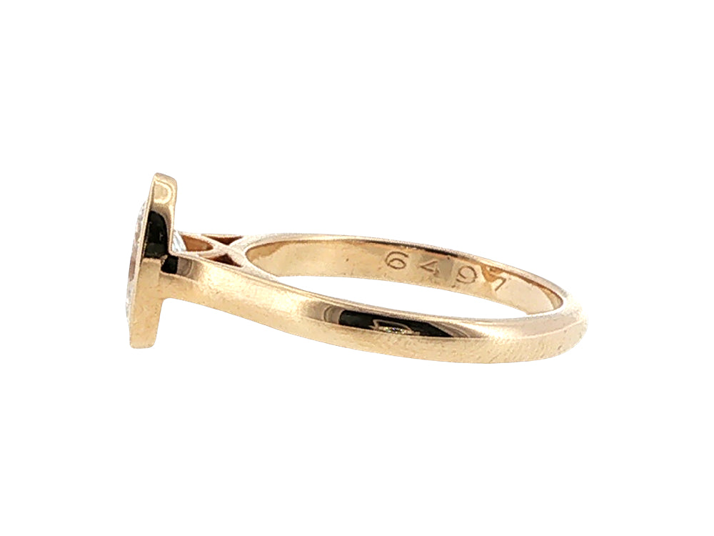 Lesia - one carat oval lab-grown diamond solitaire in 9ct yellow gold rubover setting