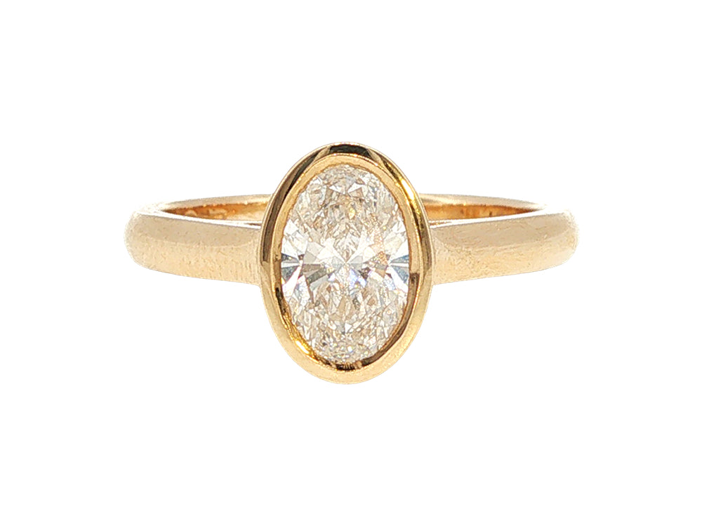 Lesia - one carat oval lab-grown diamond solitaire in 9ct yellow gold rubover setting