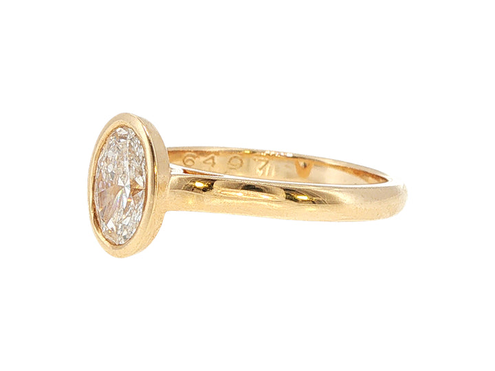 Lesia - one carat oval lab-grown diamond solitaire in 9ct yellow gold rubover setting