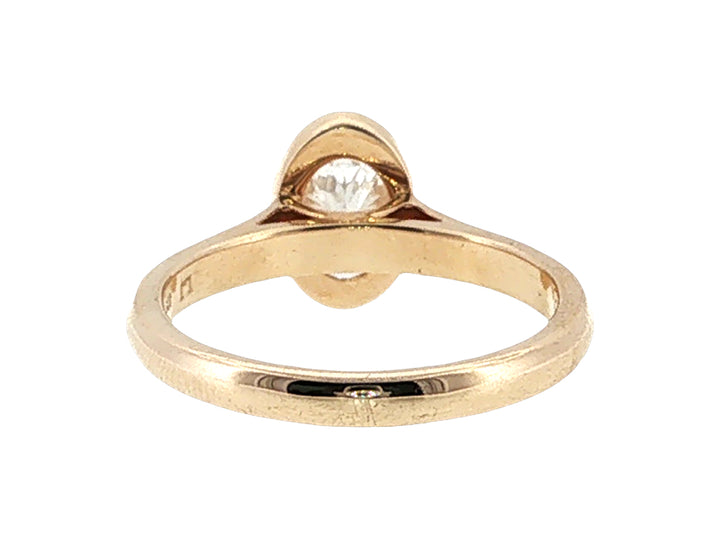 Lesia - one carat oval lab-grown diamond solitaire in 9ct yellow gold rubover setting