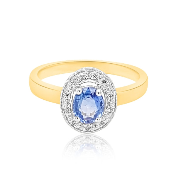 Laura - oval ceylonese sapphire and diamond halo ring in yellow and white gold
