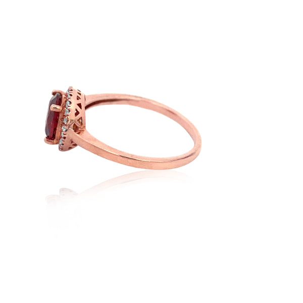 Garnet and diamond halo dress ring in 9ct rose gold