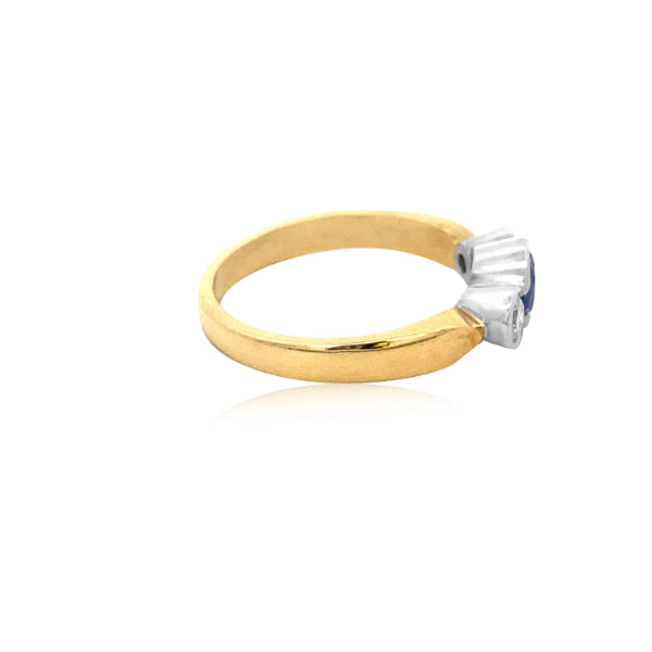 Reka - round ceylon sapphire and diamond three stone ring in 18ct yellow gold.