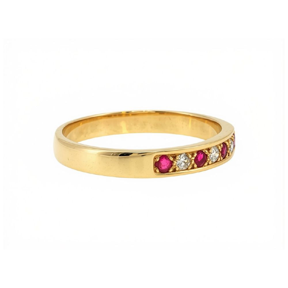 Ruby and three stone diamond bead set ring in 9ct yellow gold